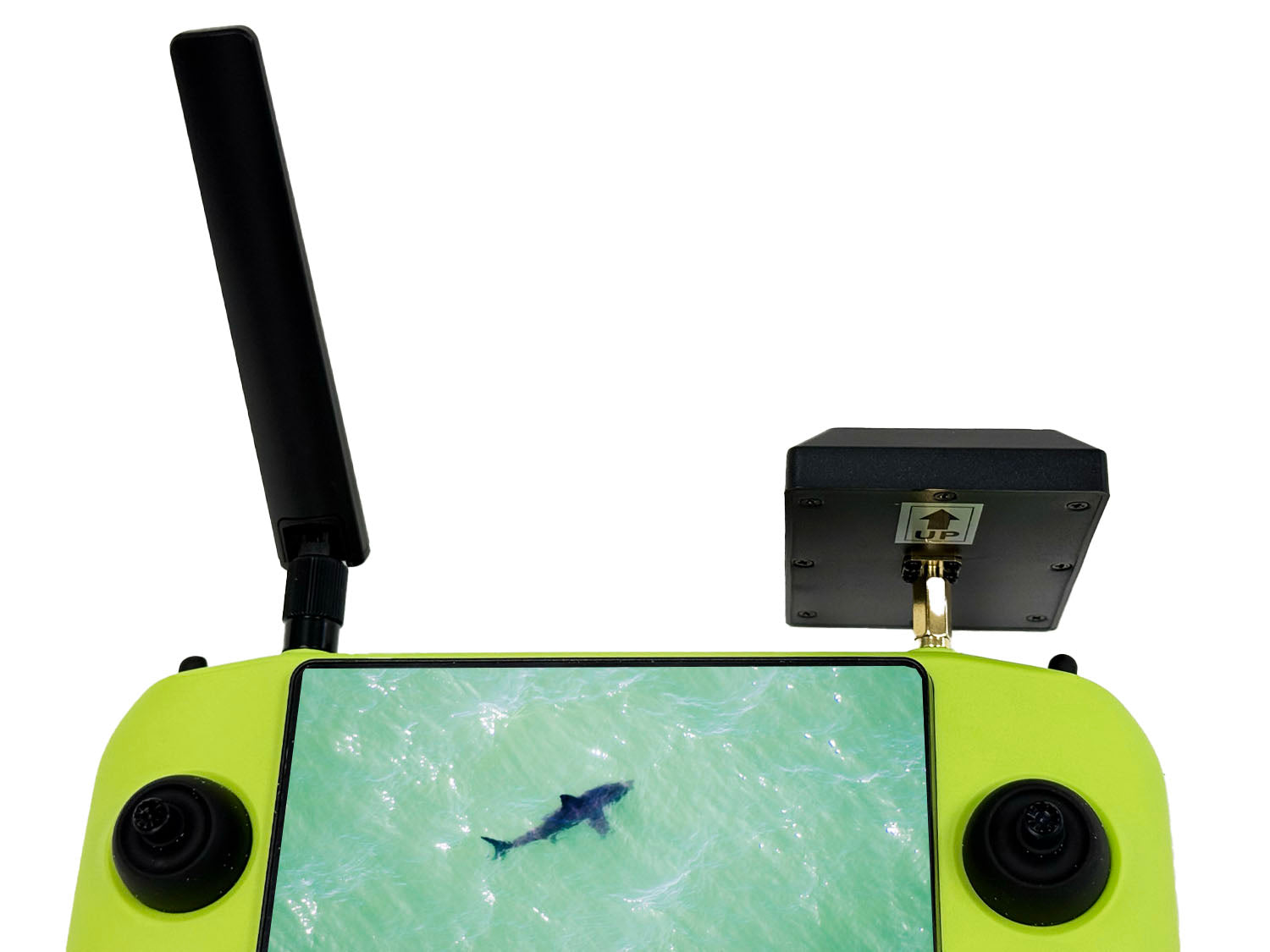 Close-up of XPECE drone remote controller with video extender patch antenna and long-range remote antenna installed